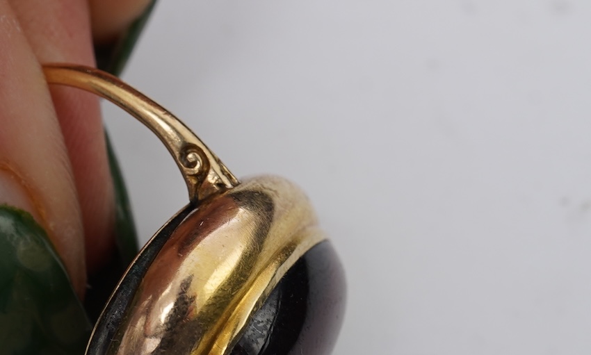 An unusual garnet locket ring, late 19th century composite
